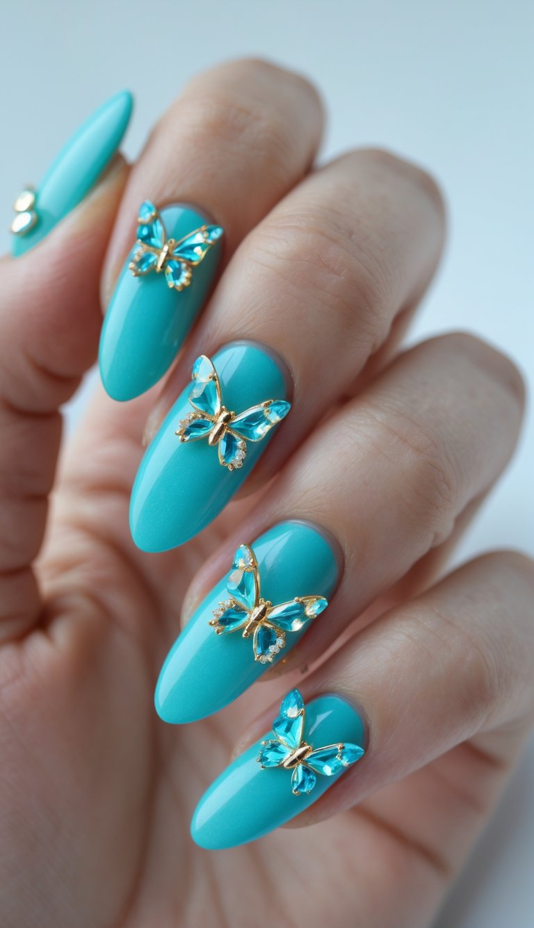 Glossy teal nails adorned with blue gemstone butterfly accents outlined in gold, creating a glamorous butterfly nail art idea.