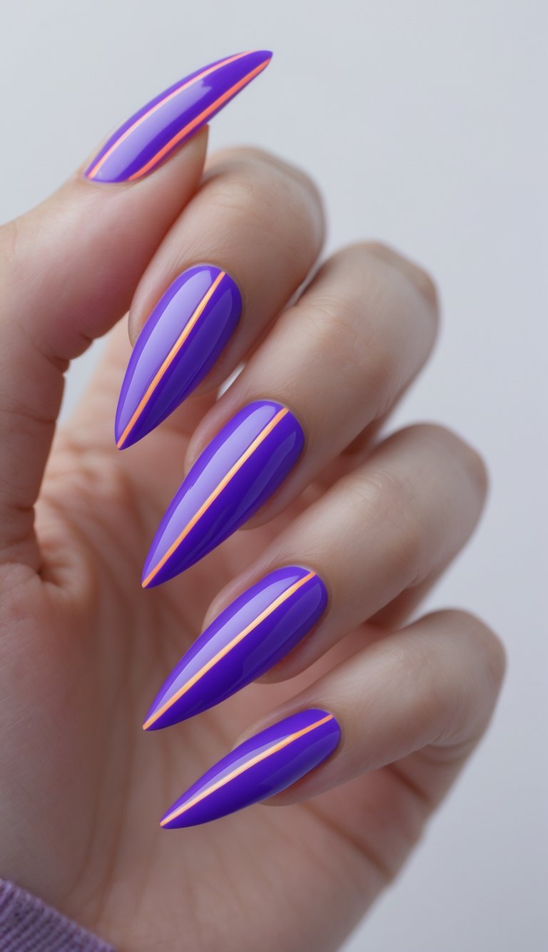 Stiletto nail art idea with sharp purple nails accented by neon orange center stripes for a sleek, edgy vibe