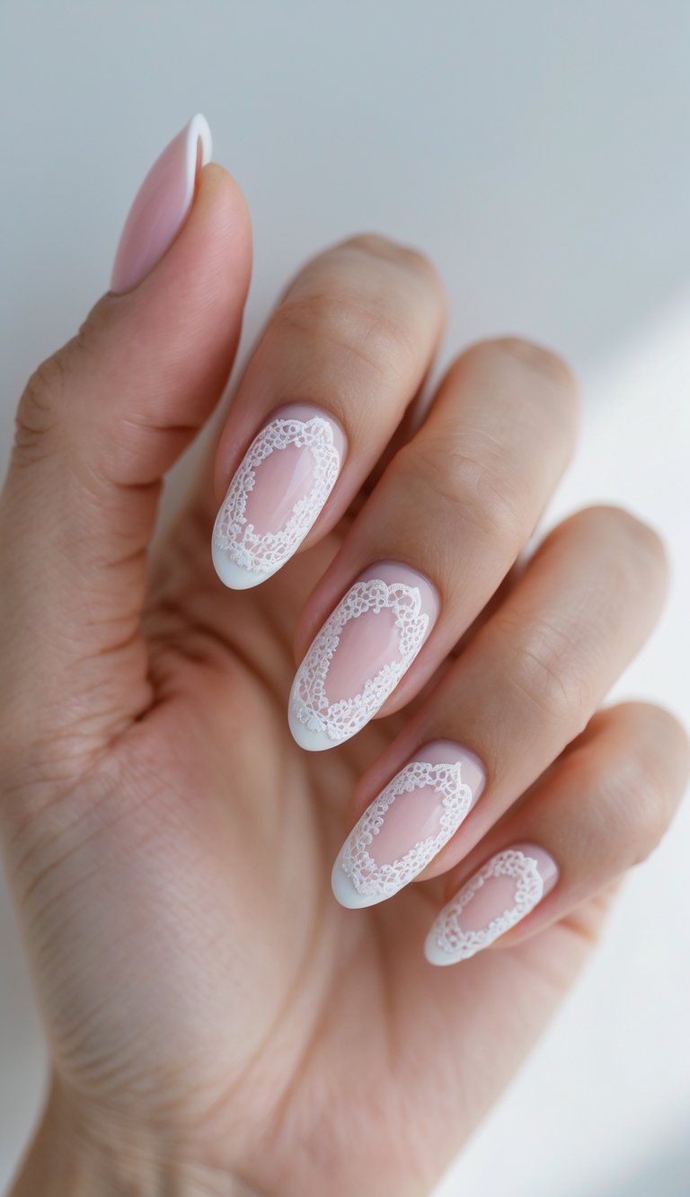 Elegant hand displaying an anniversary nail art idea with blush-toned nails outlined in fine white lace, resembling bridal embroidery for a classic, graceful finish.