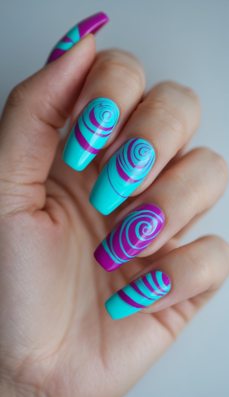 Vibrant swirl nail art idea on a hand showing bold aqua and purple spiral patterns, giving off a youthful and eye-catching candy-inspired energy.