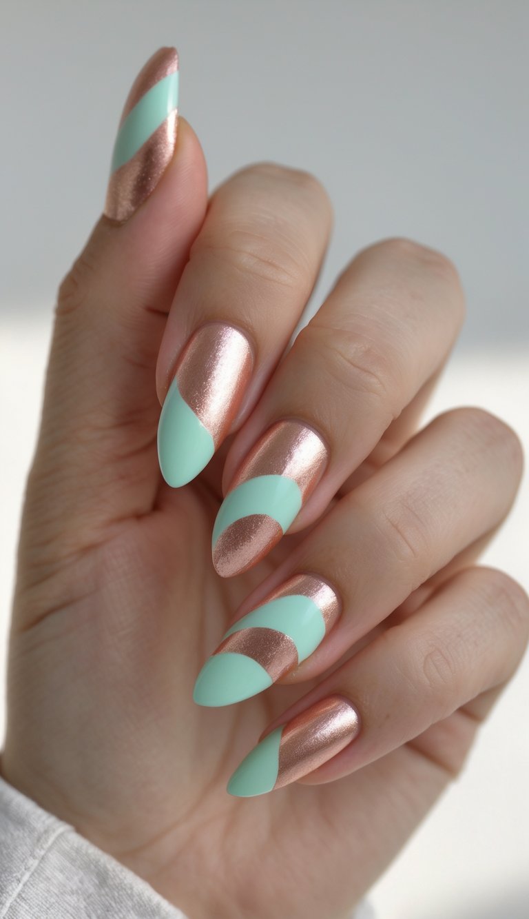 Elegant swirl nail art idea showing a hand with rose gold nails detailed by diagonal mint green shapes, evoking a luxurious and minimalistic vibe.