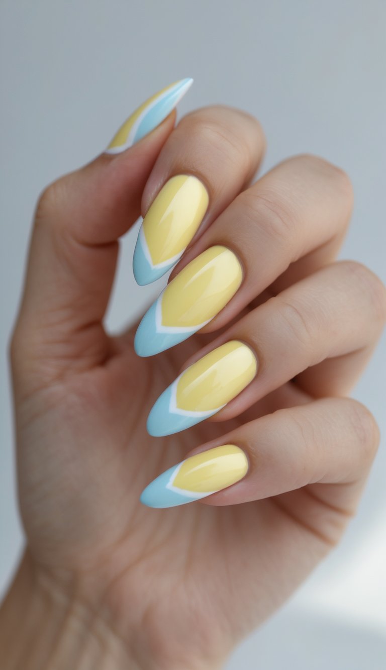 An angled view of a hand featuring lemon yellow nail art idea, where pastel yellow nails transition into soft blue French tips on almond shapes.
