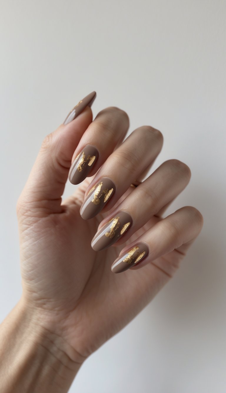 Rich mocha nails with gold foil pieces