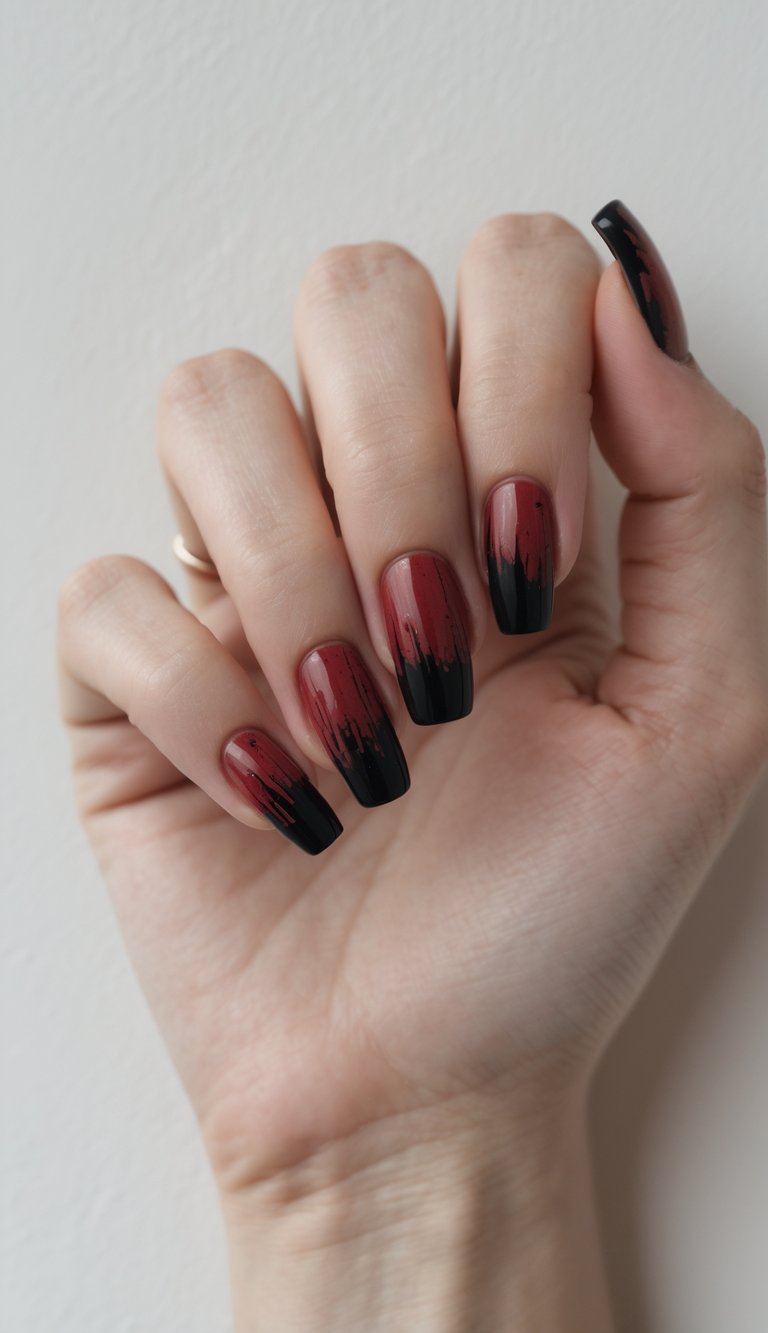 Close-up of one hand with blood red nails featuring black tips against a white background.