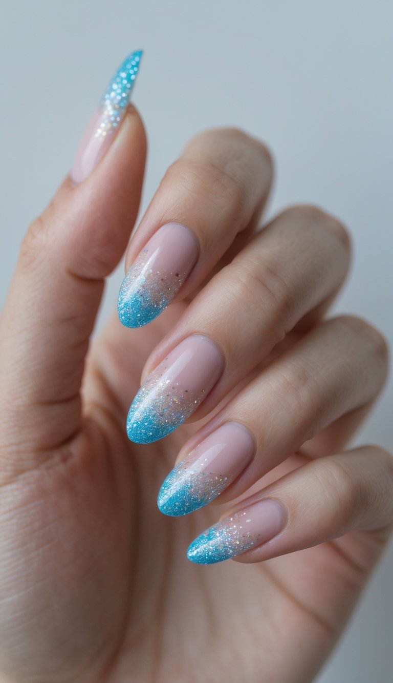 Close-up of one hand showing nails with glittery French tips and a subtle blue shine against a white background.