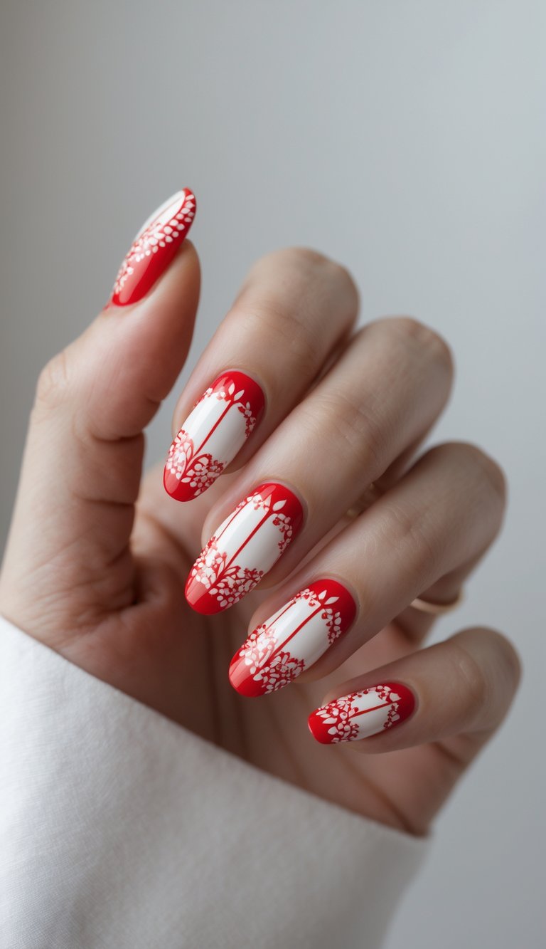 Close-up of one hand with red and white retro nail art against a white background.