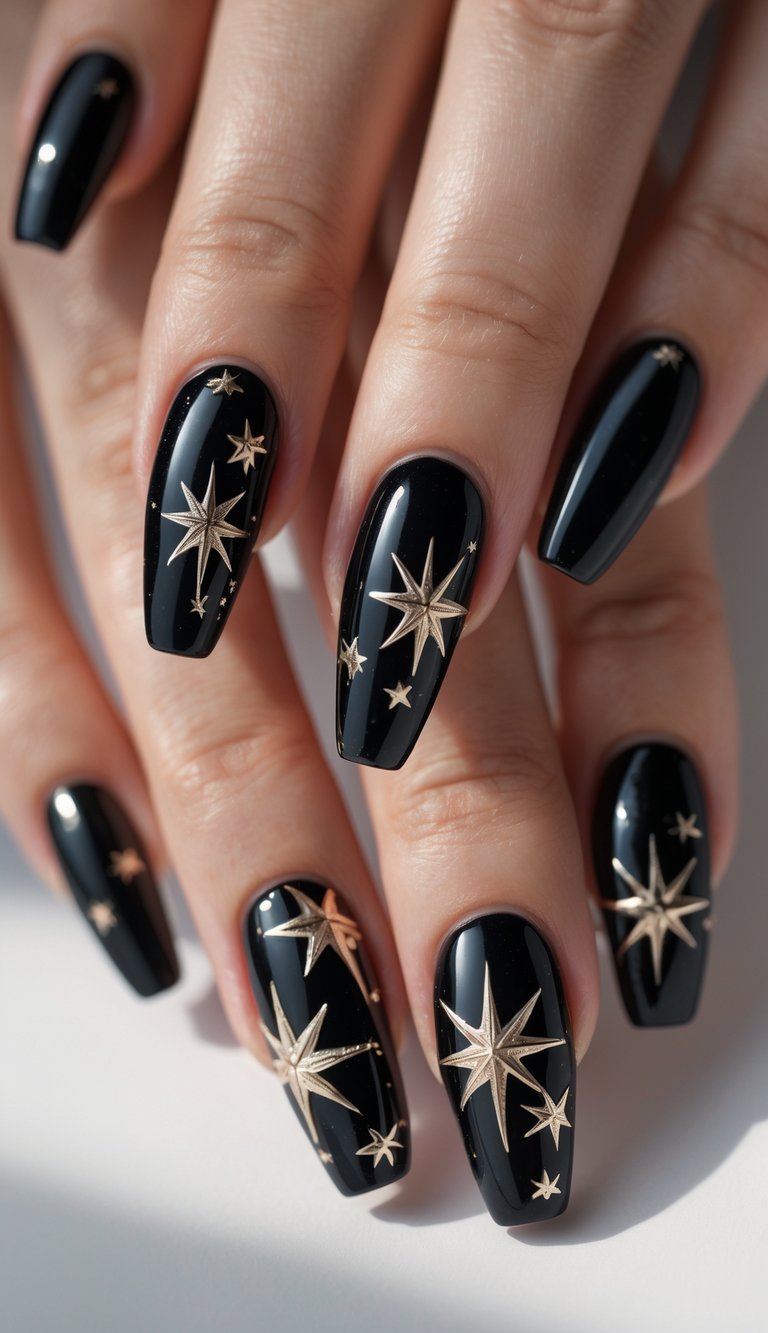 Close-up of one hand with glossy black ballerina-shaped nails decorated with metallic star designs against a white background.