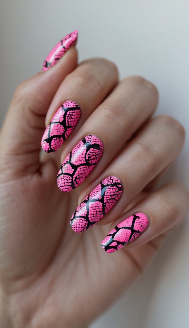 Close-up of one hand showing nails painted with electric pink snake pattern design against a white background.