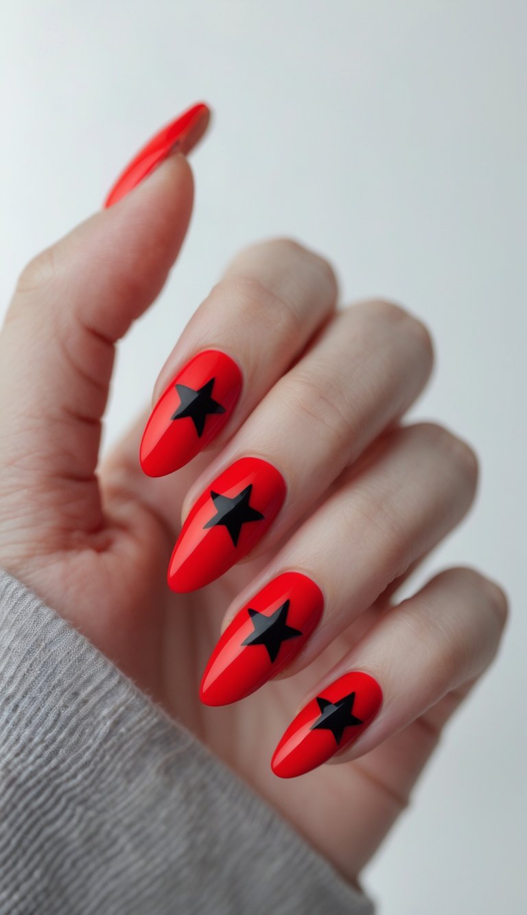 Close-up of one hand with red nails decorated with black star shapes against a white background.