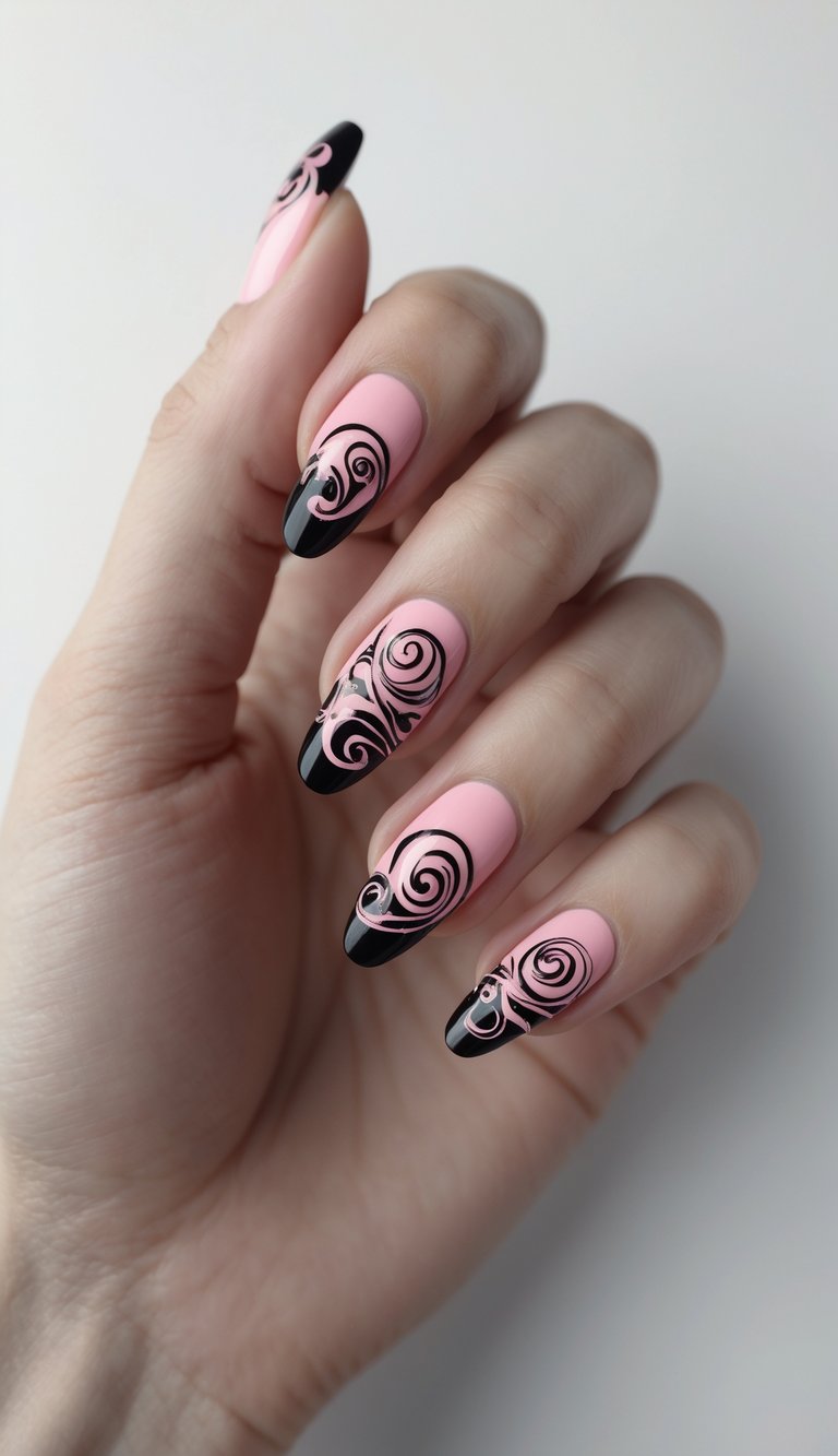 Close-up of one hand with pink and black swirl nail art against a white background.