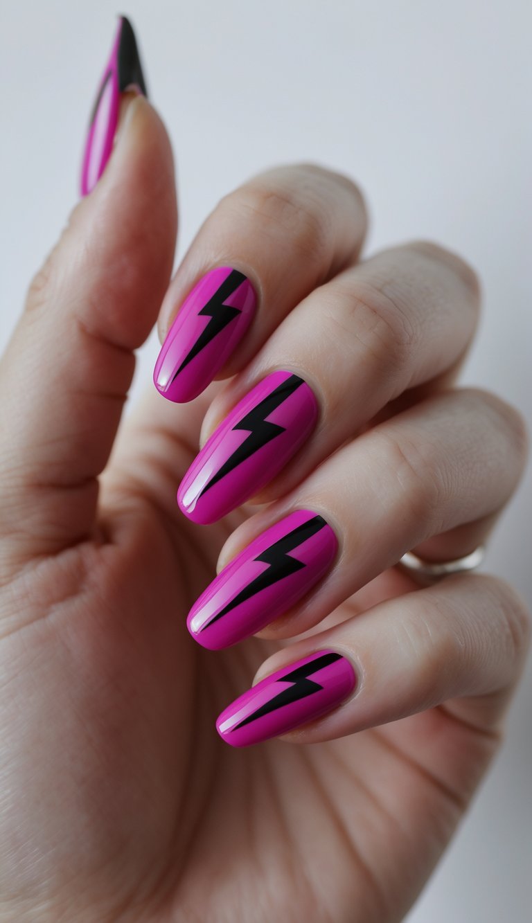 Close-up of one hand with magenta nails decorated with black lightning bolt designs against a white background.