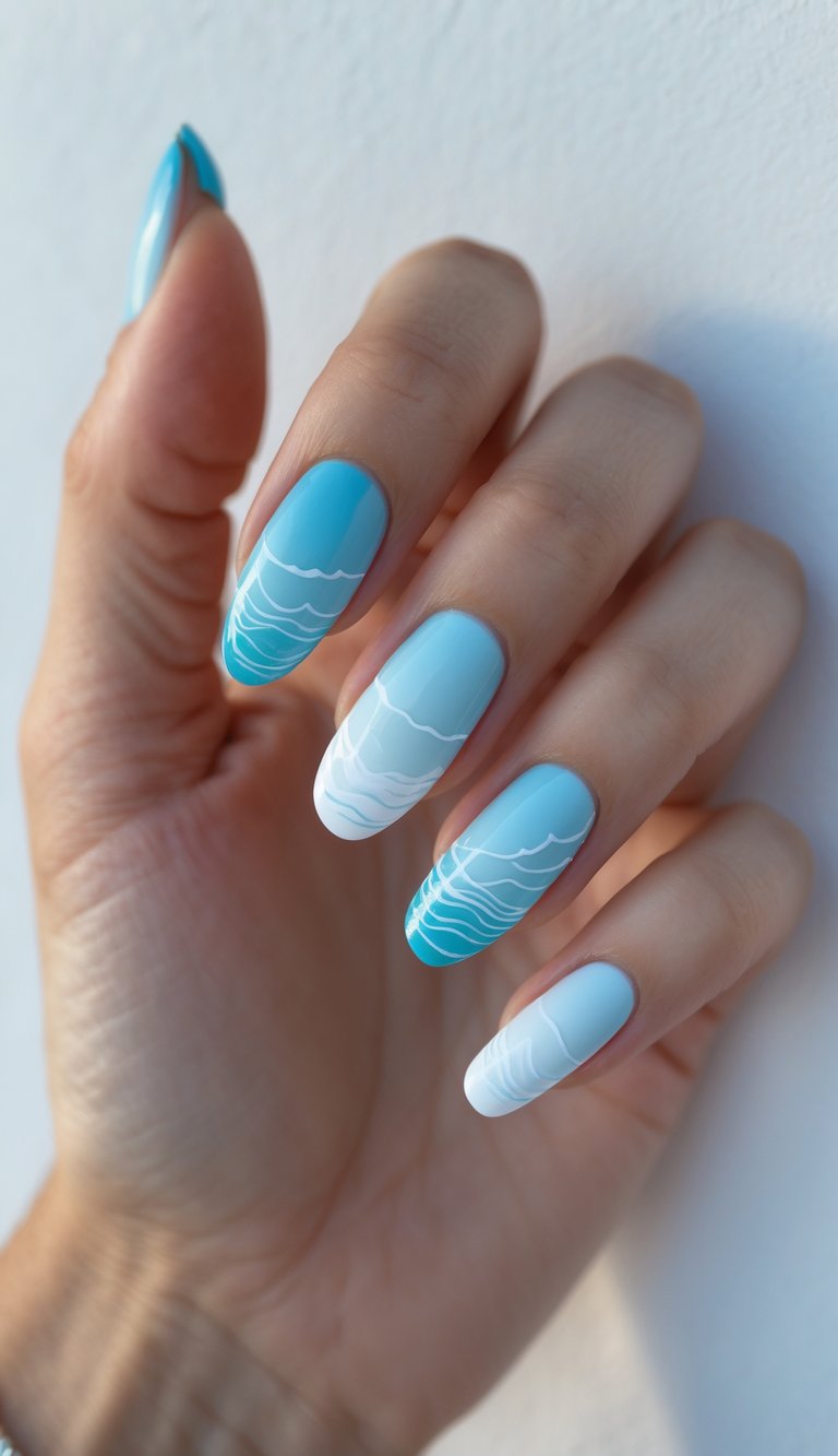 Close-up of one hand with light blue and white ocean wave nail art on a white background.