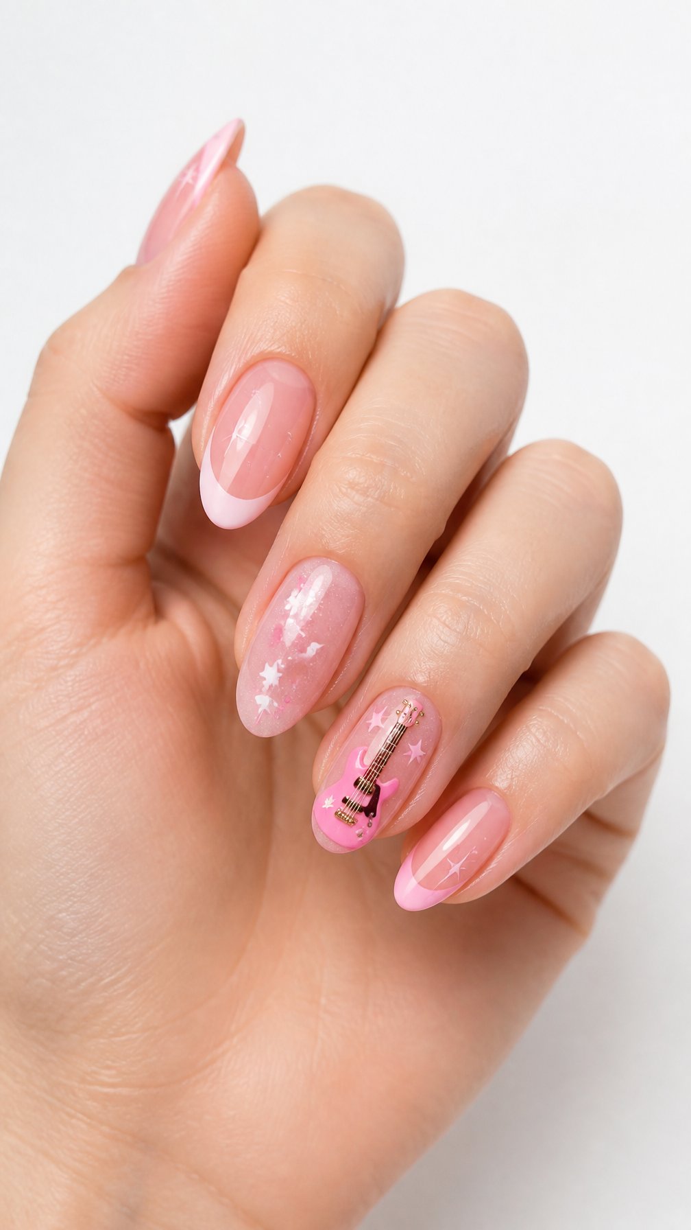 A single hand with glossy pink manicured nails, including one nail decorated with a tiny pink guitar.