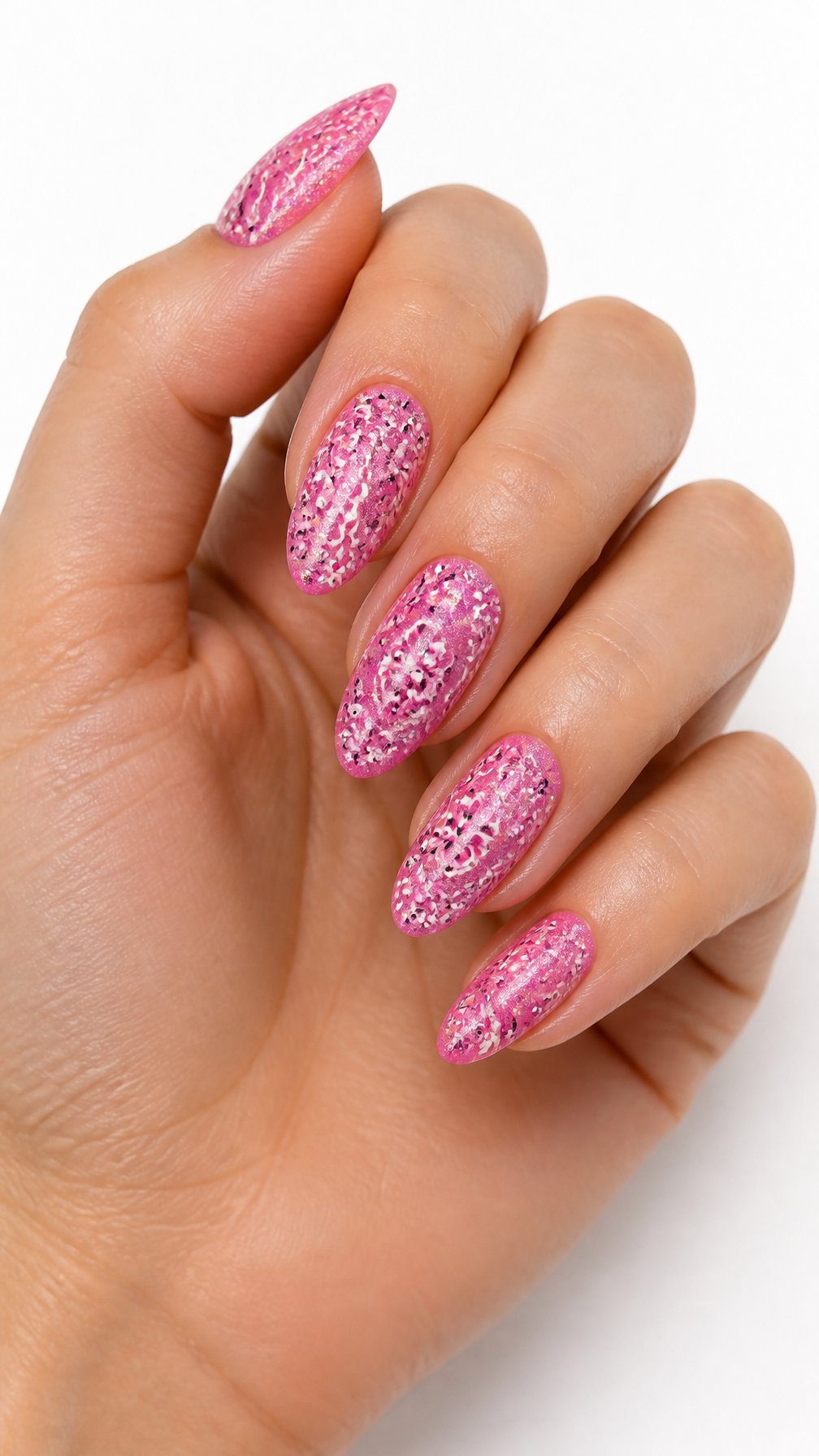 A single hand with glossy pink glitter nails decorated with white paisley bandana patterns on a white background.